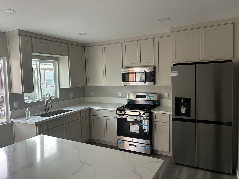 Included: Stove, Microwave, and Refrigerator