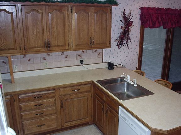 Kitchen w/ sliders to deck