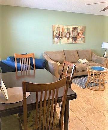 Table with seating for 3 in entryway/ living room