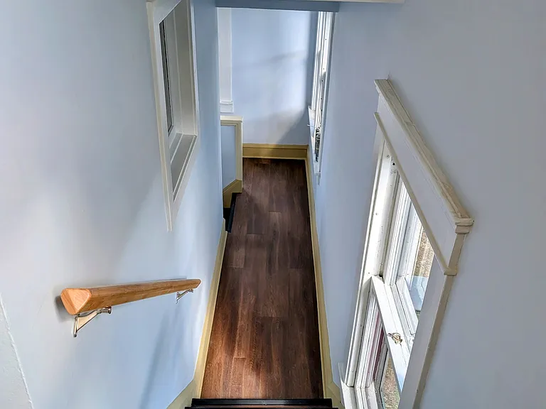 Newly renovated super clean and well lit hallway with 5 sensor lights