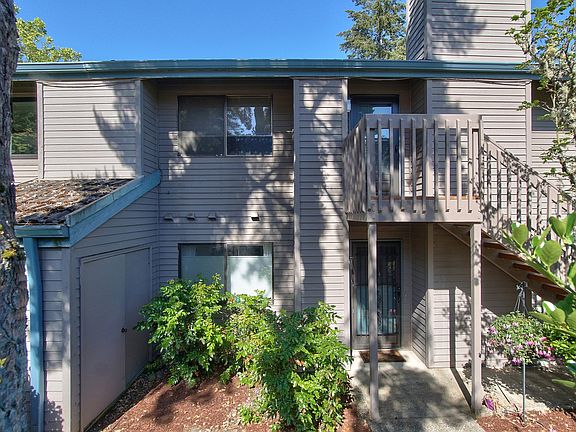 Front exterior view w/beautiful foliage and shade trees