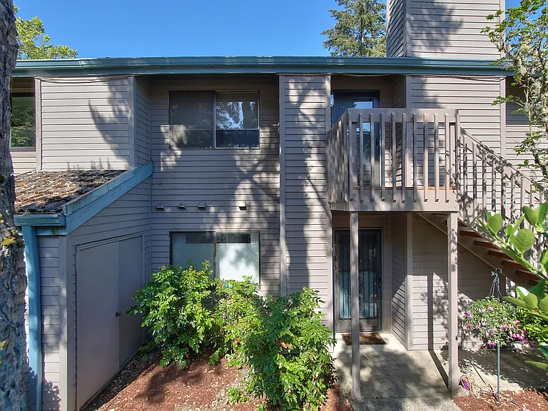Front exterior view w/beautiful foliage and shade trees