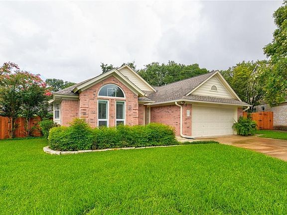 Fantastic curb appeal with well landscaped front yard.