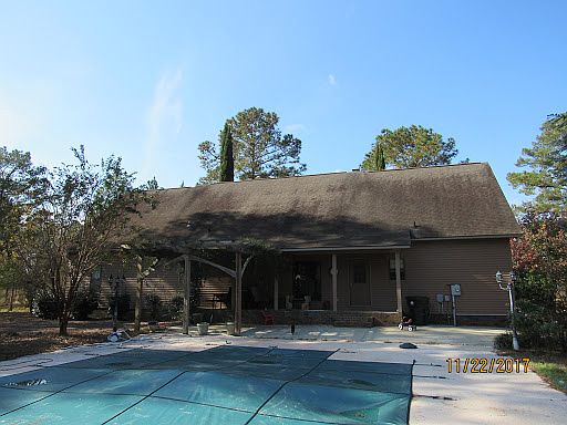 back view. in ground pool