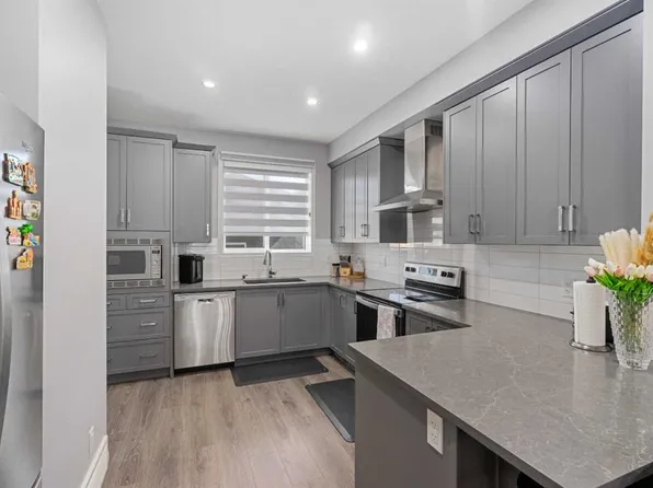 56 NW Belmont Grn SW, Calgary, AB T2X 5E3