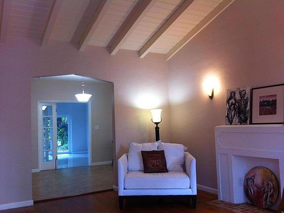 Wood beamed cathedral ceiling in Living Room