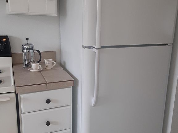 Full-size refrigerator offers plenty of storage for fresh food.