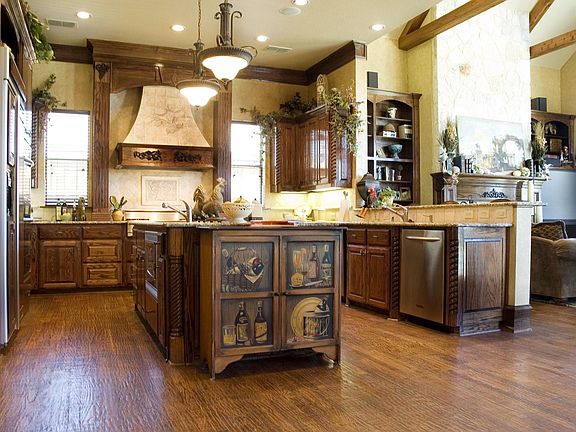 Kitchen open to Greatroom with Cedar Beamed Ceiling