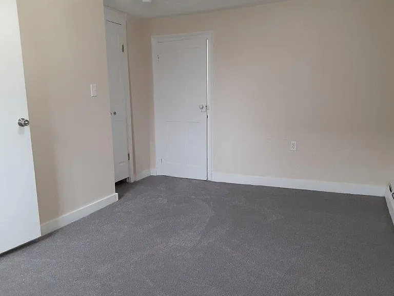 Bedroom 1 has closet and entrance to bathroom