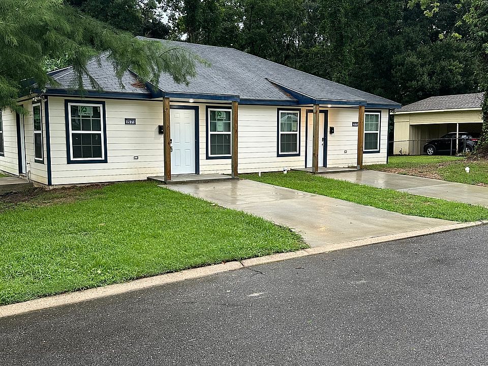 Front of the property, private parking