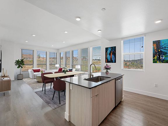 Enjoy the spacious flow of our open concept kitchen and living room, perfect for modern living and entertaining.