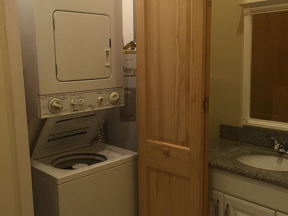 Stacked washer and dryer.