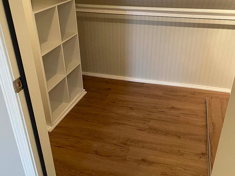 one of two closets in bonus room, could be playroom for young kids