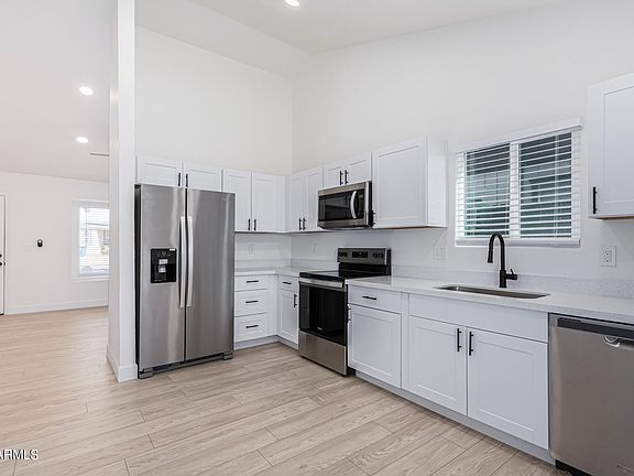 2nd image of 9841 E BIRCHWOOD Avenue