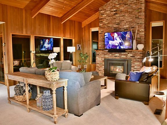 The Great Room is comfy on a rainy evening with a fire and f