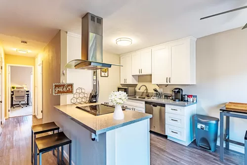 Sit or grab a drink on the spacious kitchen island as you keep the chef company - 9504 Carroll Canyon Rd #204