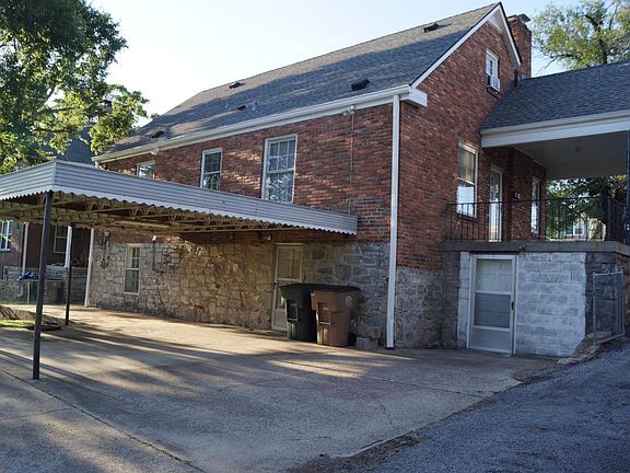 Rear view / covered parking and patio