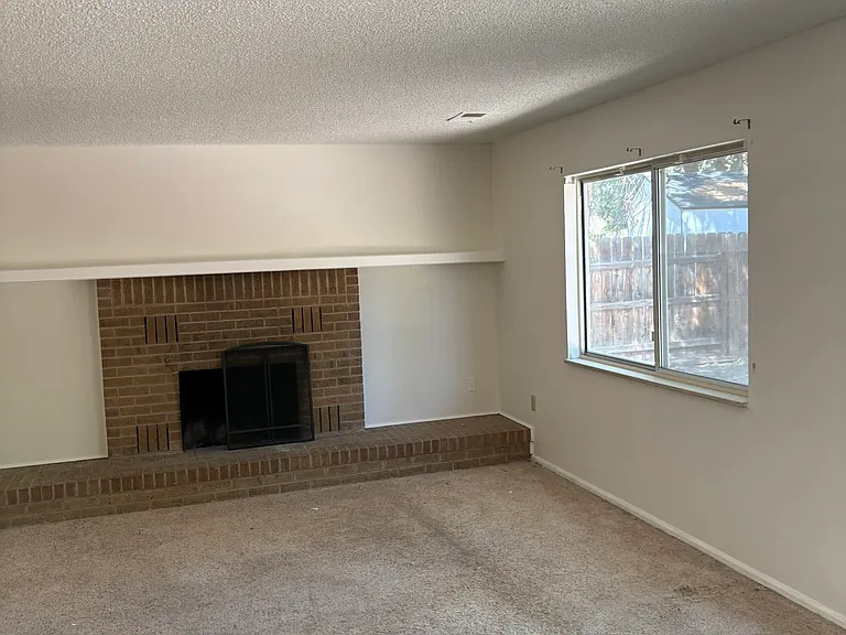Wood burning fireplace in the family room. Opens to back yard.