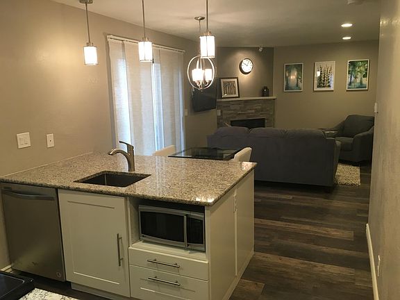 Kitchen items include toaster, coffee maker, Keurig, knives,