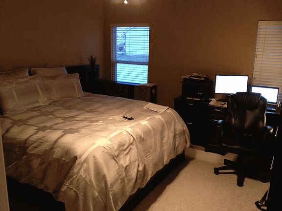 Large Master bedroom with vaulted cielings
