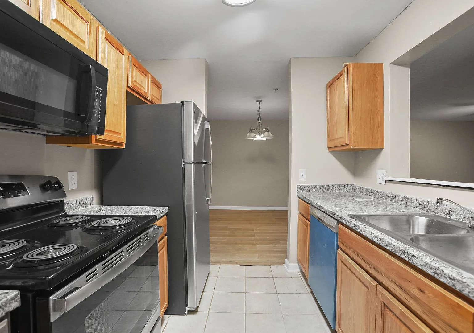 Spacious Three-Bedroom Condo with In-Unit Laundry — Photo 4