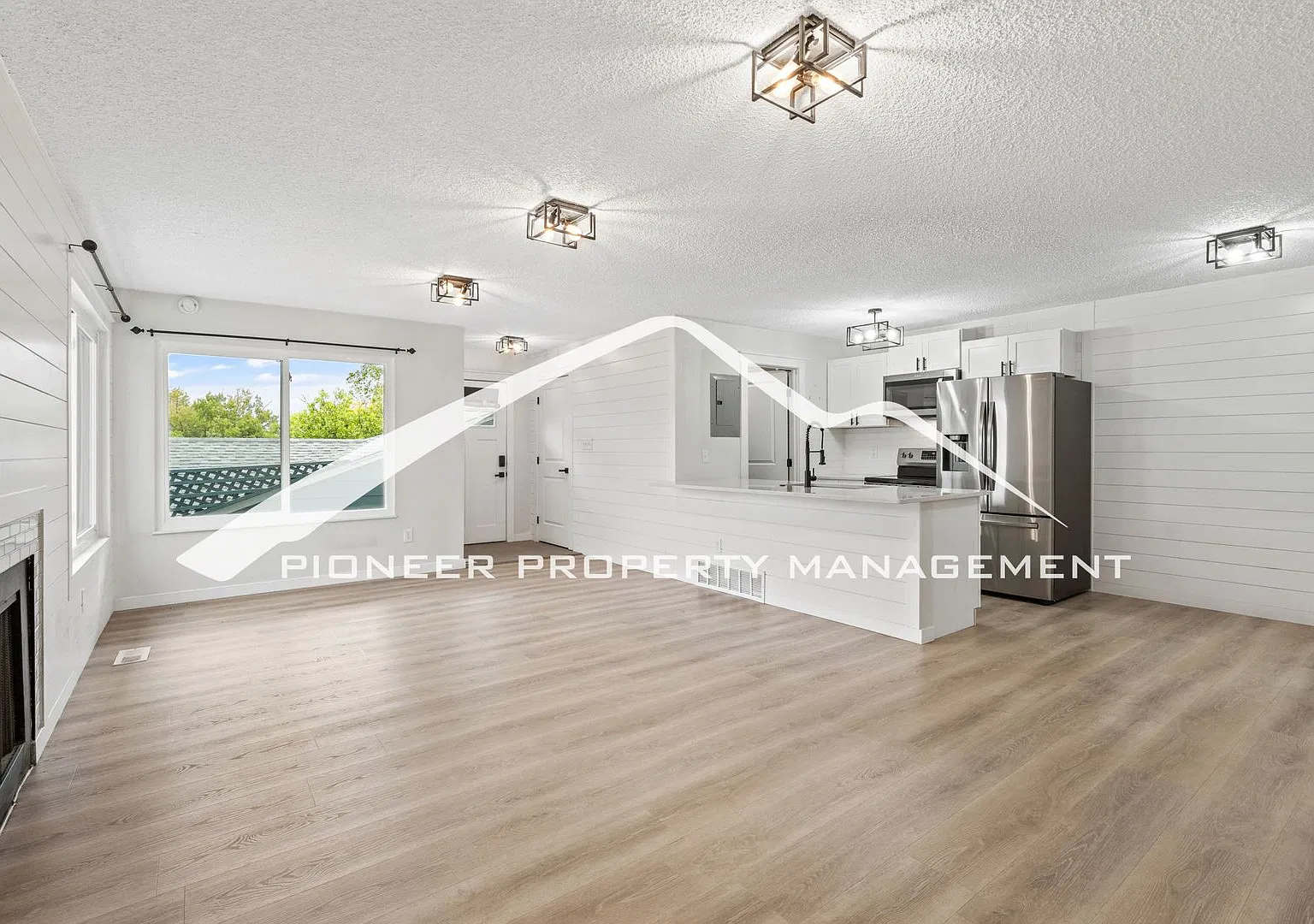 Remodeled 2 Bedroom Condo with Covered Parking, In Unit Laundry, AC and Private Storage — Photo 3