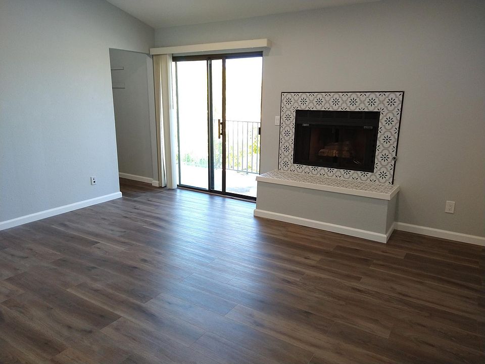 Master suite with gas fireplace, walk-in closet, vaulted ceiling