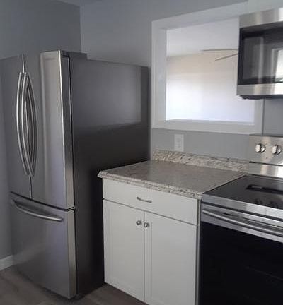 3rd image of 135 NE Pinelake Village Blvd