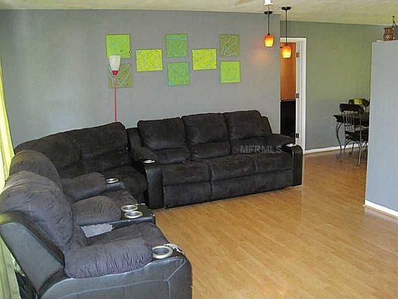 Open living room with newer laminate floors