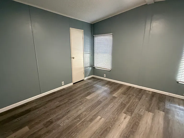 large master bedroom with walk in closet
