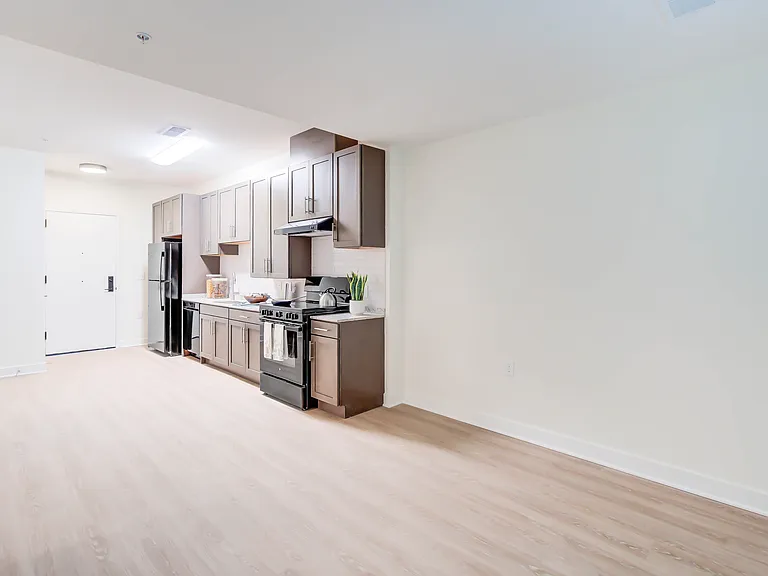 Living/Dining/Kitchen Area- A 1BR-H ANSI Accessible Floor Plan