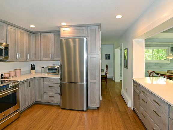 Kitchen with a view to the dining room and breakfast area