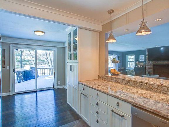 Kitchen looks out to the deck and living room.