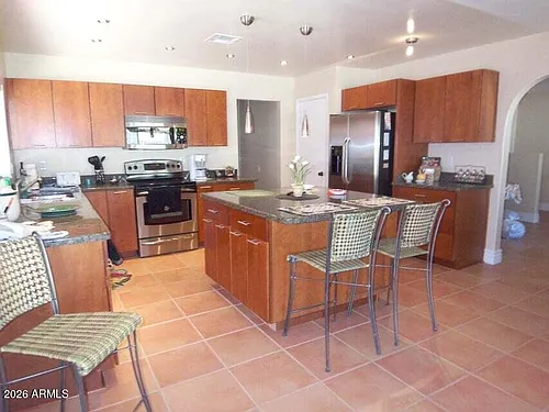 5118 E Gelding Dr Photo 1