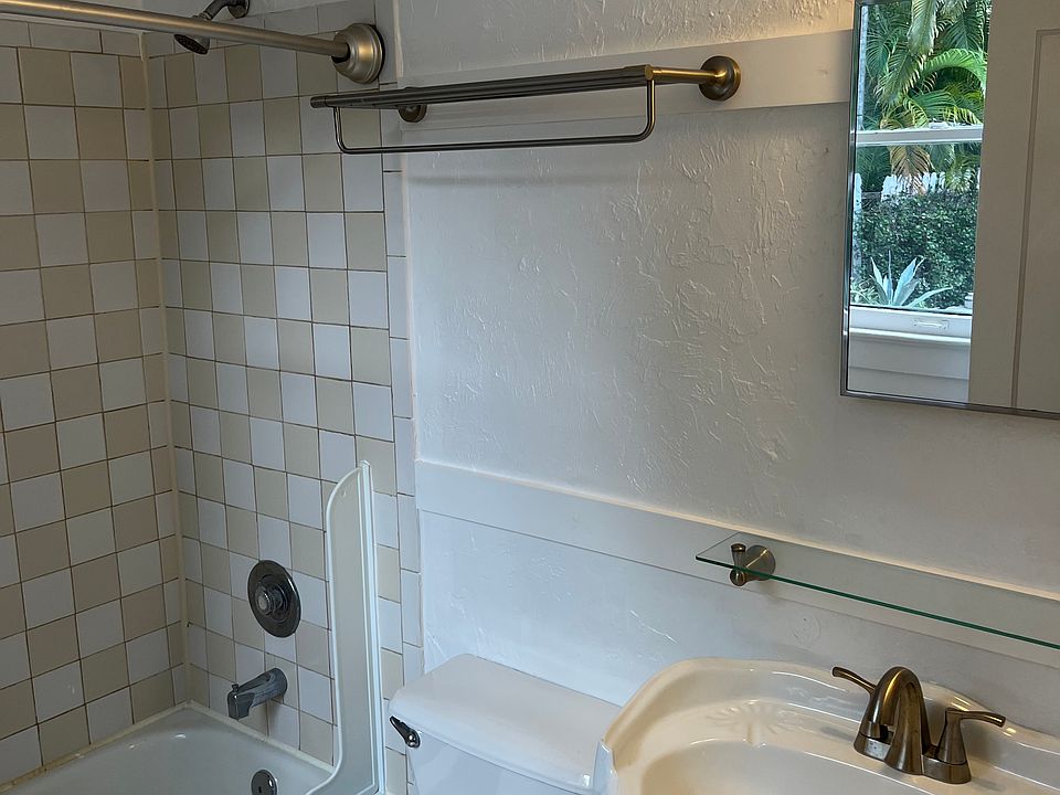 Bathroom overlooking pool