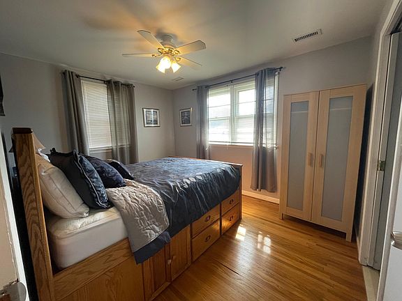 Master bedroom with queen bed and full bathroom