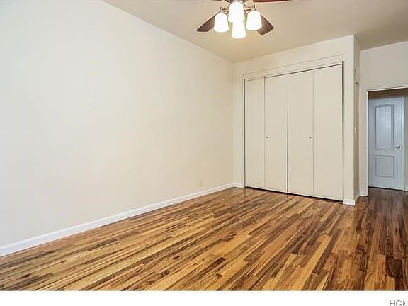 The master bedroom, with a wall of closets, can comfortably accommodate a king-sided bed