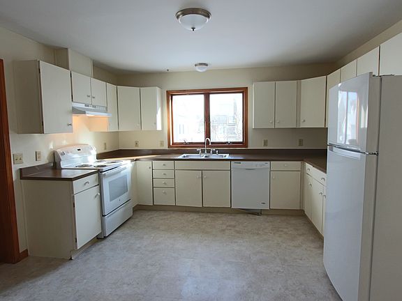 Spacious kitchen, includes dining area.
