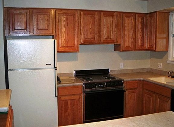 Kitchen has some updatesand has an eating bar.