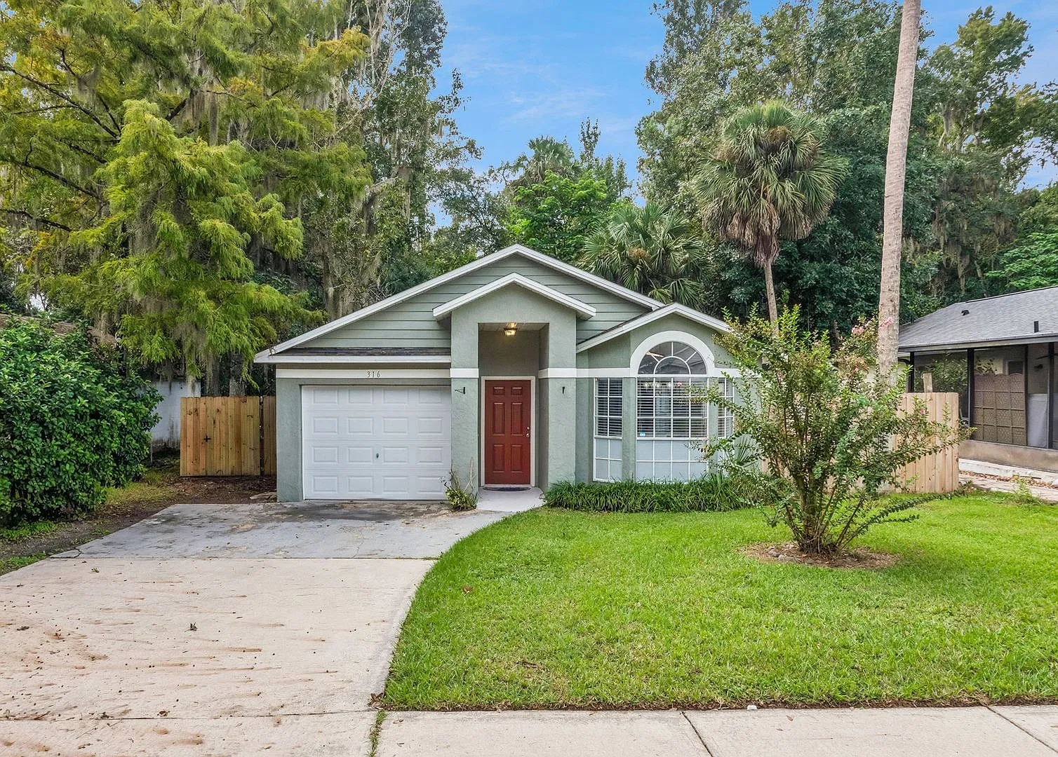 Apopka 3/2 Home w/ Garage and Large Fenced Yard ~ All Tile Floors ~ Must See! — Photo 1