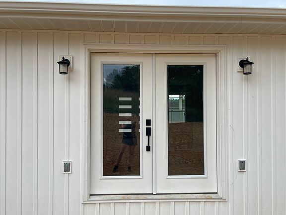 French back doors to back concrete patio (concrete to be installed)