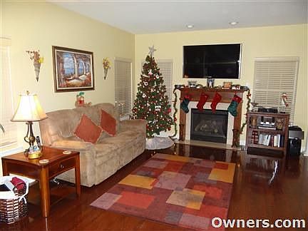 Spacious Living Room with Lovely Fireplace!
