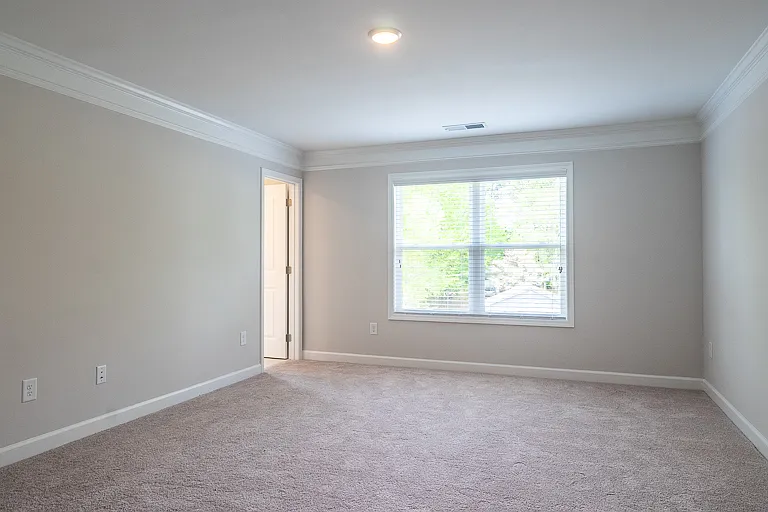 Another view of the spacious primary bedroom!
