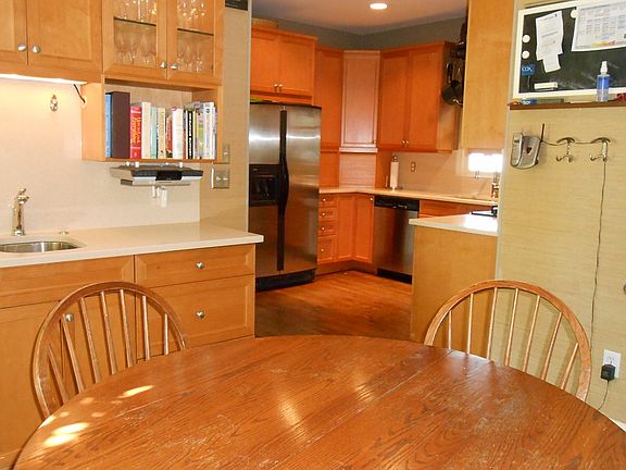 Here's a shot of the breakfast room looking into the kitchen. Laundry room is around the corner with room for extra storage. Pantry, too.