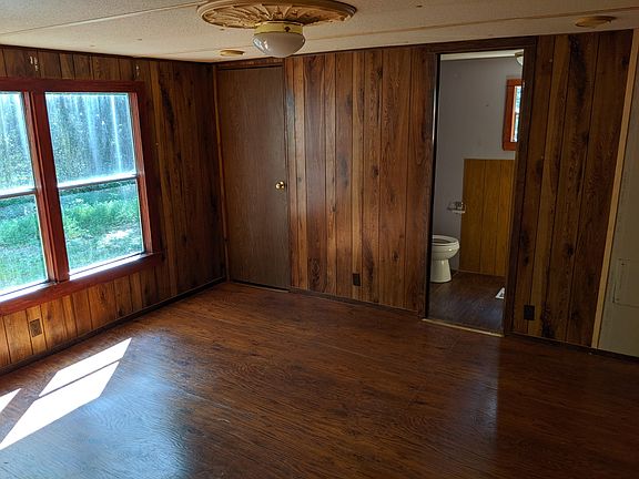 Master bedroom with walk-in closet and private master bathroom