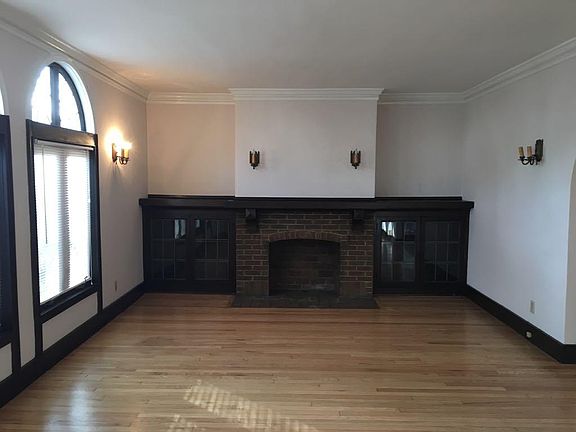 Living Room Hearth and Original Built-Ins