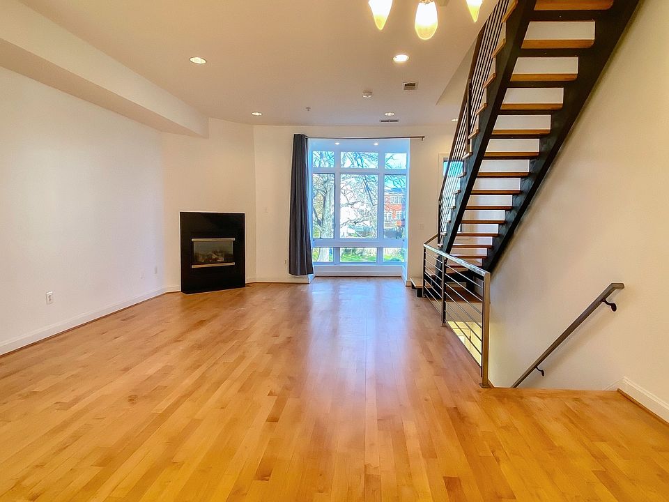 Large living room with a working gas fireplace