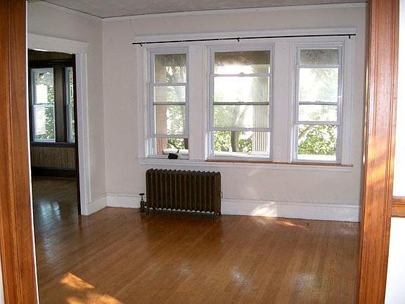 The rest of A side living room and its door way (D side) to the sunroom