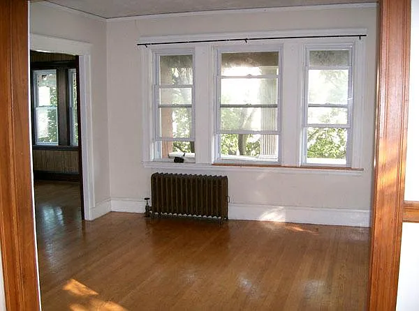 The rest of A side living room and its door way (D side) to the sunroom