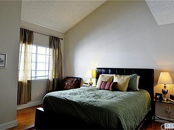 master bedroom. high vaulted ceilings